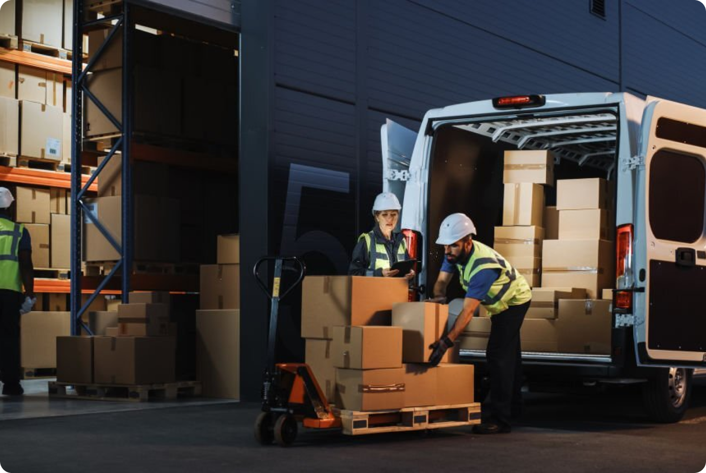 image of workers loading items to be transported